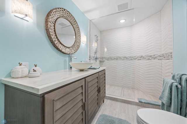 505 Tessa Dr, Moorhead, MN 56560 - full bathroom featuring recessed lighting, toilet, walk in shower, visible vents, and vanity