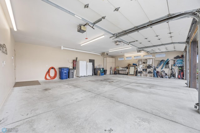 505 Tessa Dr, Moorhead, MN 56560 - garage featuring a garage door opener