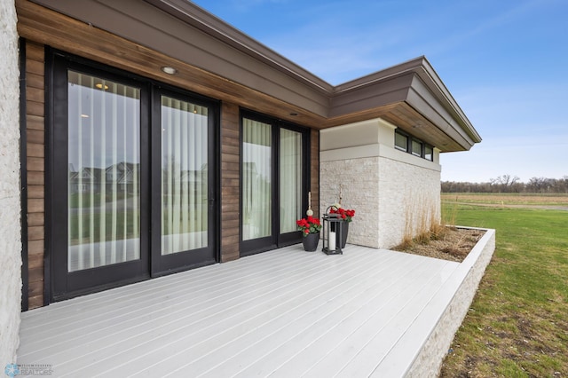 505 Tessa Dr, Moorhead, MN 56560 - wooden terrace featuring a yard