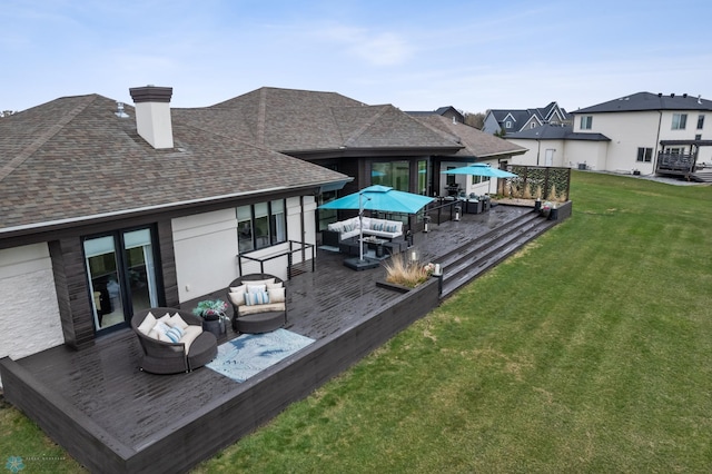 505 Tessa Dr, Moorhead, MN 56560 - back of house with a chimney, a deck, a lawn, an outdoor hangout area, and roof with shingles