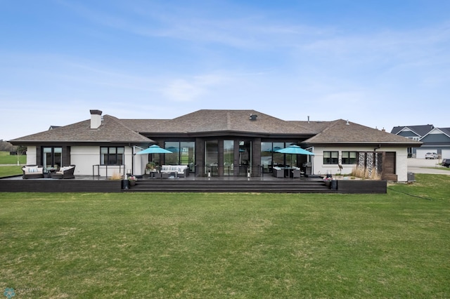 505 Tessa Dr, Moorhead, MN 56560 - rear view of property featuring an outdoor hangout area and a lawn
