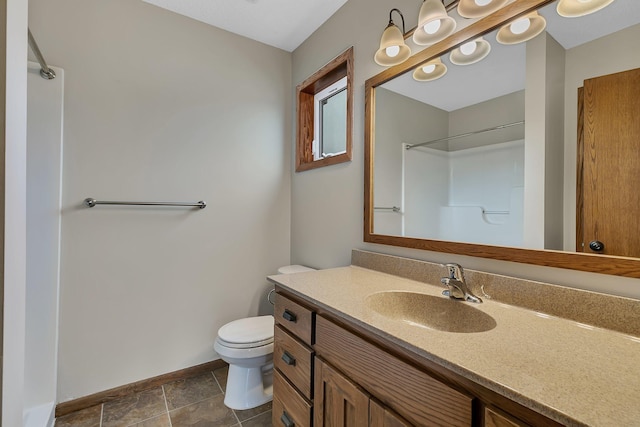 103 Grandview Ct, Buffalo, MN 55313 - bathroom featuring baseboards, vanity, toilet, and a shower