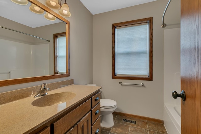 103 Grandview Ct, Buffalo, MN 55313 - full bathroom with vanity, baseboards, toilet, and shower / tub combination