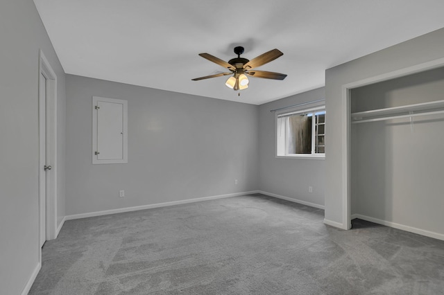 103 Grandview Ct, Buffalo, MN 55313 - unfurnished bedroom featuring carpet floors, a closet, baseboards, and a ceiling fan