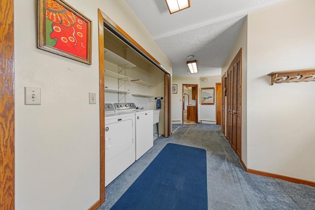 hall featuring washer and dryer, carpet flooring, and baseboards