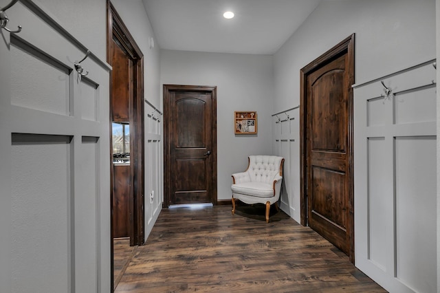 interior space with recessed lighting, baseboards, and dark wood-style floors
