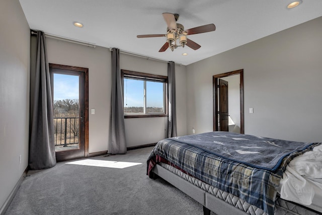 bedroom featuring light colored carpet, recessed lighting, baseboards, and access to exterior