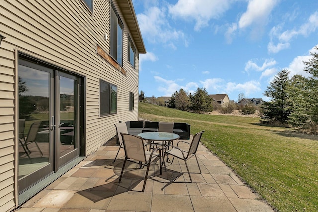 view of patio featuring outdoor dining area
