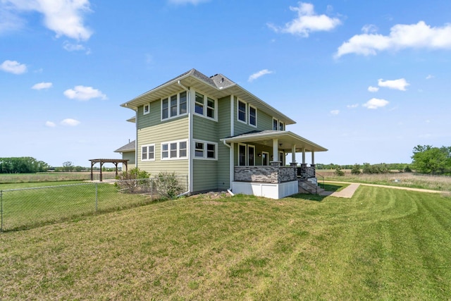 2724 Neal Ave N, West Lakeland Twp, MN 55082 - rear view of house with a porch