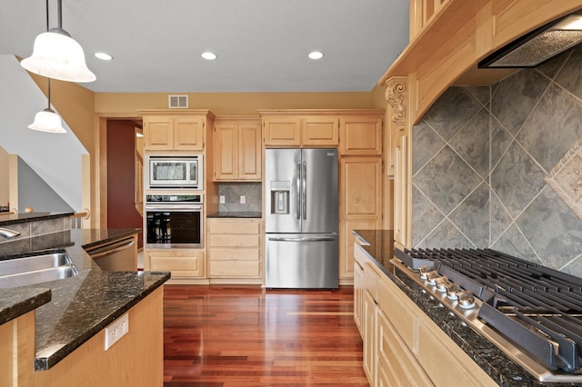 2469 Tournament Players Cir S, Blaine, MN 55449 - kitchen featuring a sink, appliances with stainless steel finishes, tasteful backsplash, and visible vents