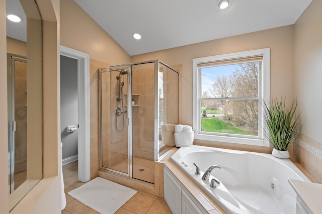 2469 Tournament Players Cir S, Blaine, MN 55449 - bathroom with a whirlpool tub, a shower stall, and tile patterned flooring