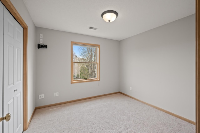 2469 Tournament Players Cir S, Blaine, MN 55449 - unfurnished bedroom with carpet flooring, baseboards, and visible vents