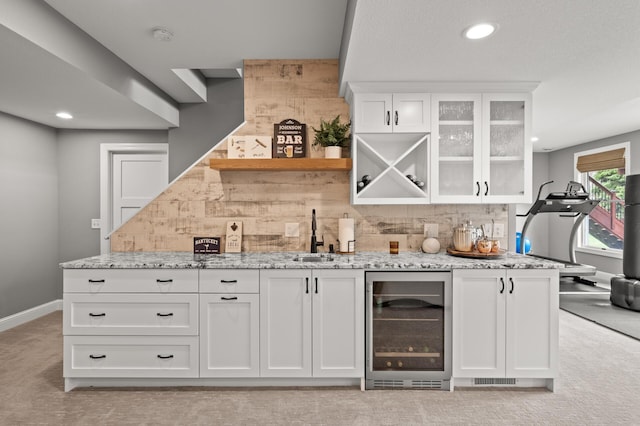 2469 Tournament Players Cir S, Blaine, MN 55449 - bar with a sink, recessed lighting, wet bar, tasteful backsplash, and wine cooler