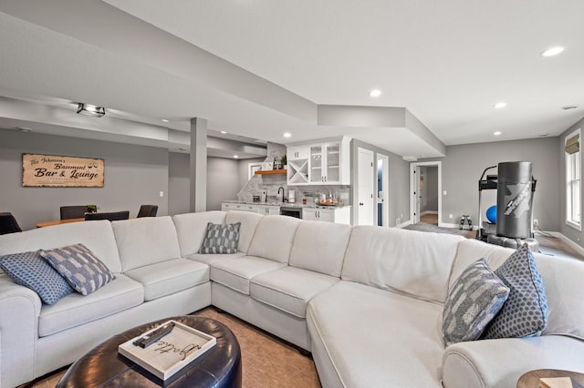 2469 Tournament Players Cir S, Blaine, MN 55449 - living room featuring indoor wet bar, recessed lighting, and baseboards