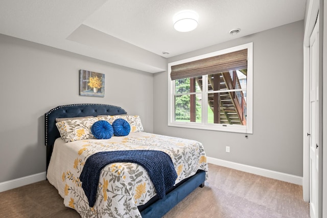 2469 Tournament Players Cir S, Blaine, MN 55449 - carpeted bedroom featuring baseboards
