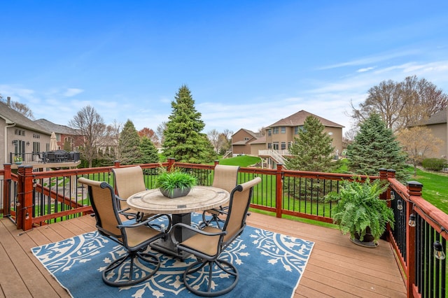 2469 Tournament Players Cir S, Blaine, MN 55449 - wooden terrace with a residential view and outdoor dining space