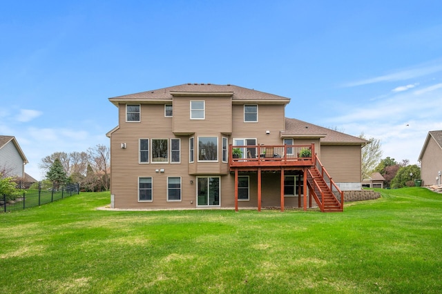 2469 Tournament Players Cir S, Blaine, MN 55449 - back of house featuring a lawn, fence, stairs, and a deck