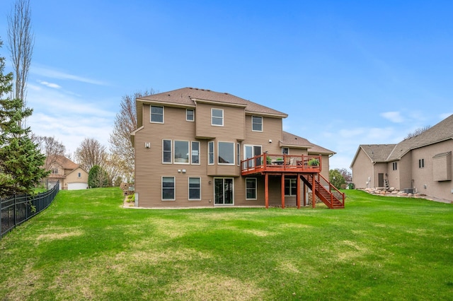 2469 Tournament Players Cir S, Blaine, MN 55449 - rear view of property featuring stairs, fence, a yard, and a deck
