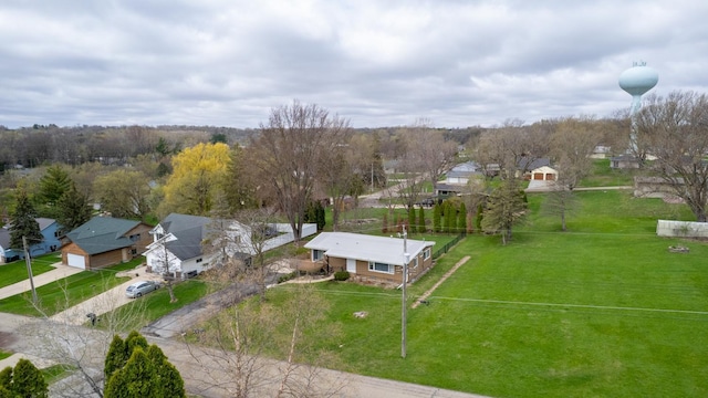 aerial view of property's location featuring nearby suburban area