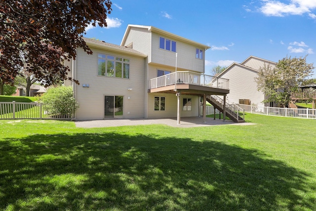 2085 128th Ln NE, Blaine, MN 55449 - back of property with stairs, a patio area, and a wooden deck
