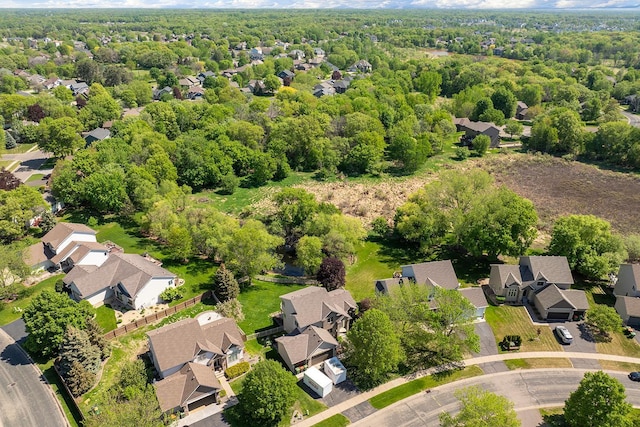 2085 128th Ln NE, Blaine, MN 55449 - aerial view of residential area with a heavily wooded area