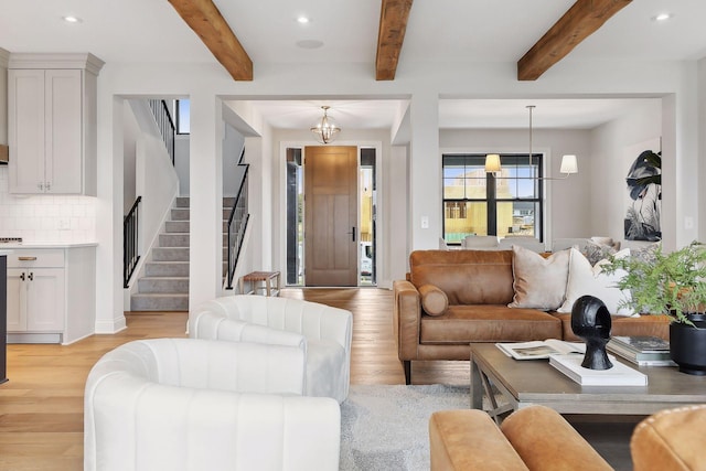 9511 Eagle Ridge Rd, Chanhassen, MN 55317 - living room featuring stairs, recessed lighting, light wood-style floors, and beamed ceiling