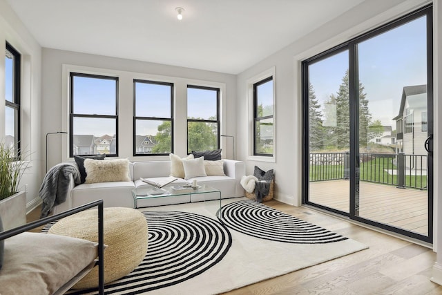 9511 Eagle Ridge Rd, Chanhassen, MN 55317 - sunroom / solarium with wood finished floors and plenty of natural light