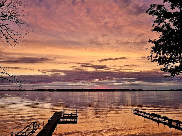 dock area featuring a water view