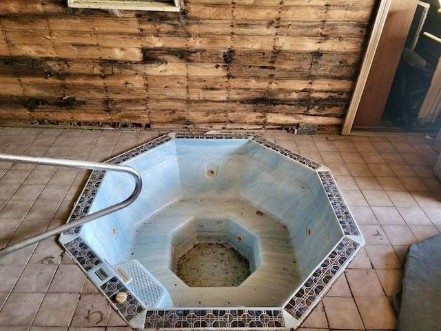 interior space featuring a hot tub