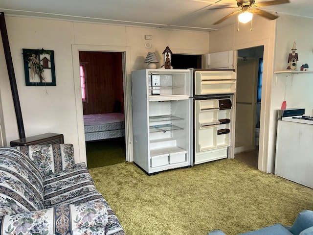 bedroom with refrigerator and carpet flooring