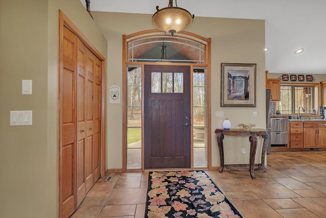 26182 Jericho Rd, Saint Joseph Twp, MN 56301 - entrance foyer with baseboards, healthy amount of natural light, and recessed lighting