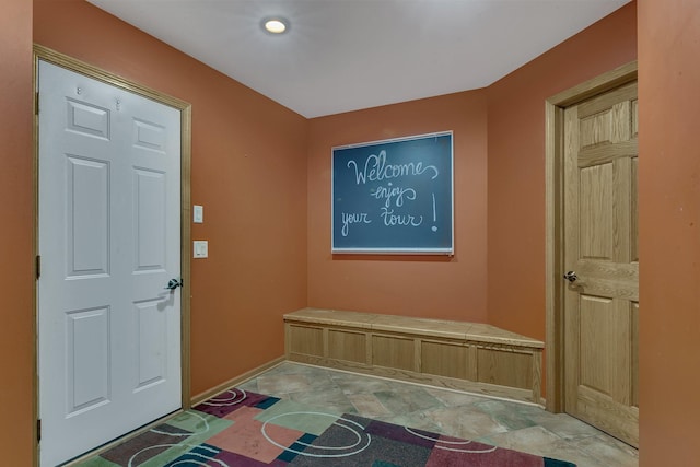 26182 Jericho Rd, Saint Joseph Twp, MN 56301 - foyer with stone finish flooring and baseboards