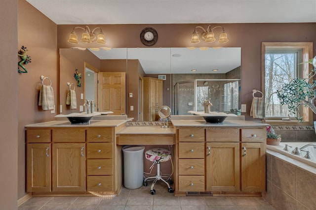 26182 Jericho Rd, Saint Joseph Twp, MN 56301 - full bathroom featuring a stall shower, a bath, vanity, and tile patterned floors