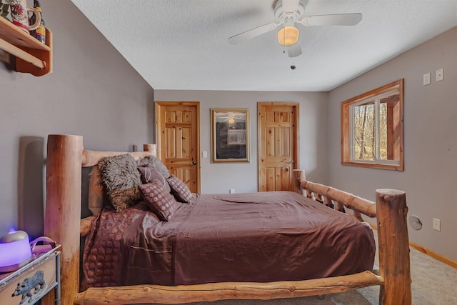 26182 Jericho Rd, Saint Joseph Twp, MN 56301 - bedroom featuring carpet, baseboards, ceiling fan, and a textured ceiling