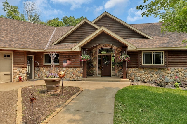 26182 Jericho Rd, Saint Joseph Twp, MN 56301 - entrance to property with roof with shingles and stone siding