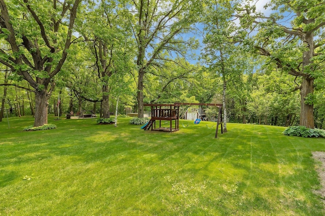26182 Jericho Rd, Saint Joseph Twp, MN 56301 - view of green lawn with a playground