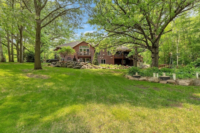 26182 Jericho Rd, Saint Joseph Twp, MN 56301 - view of green lawn with a deck