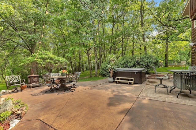 26182 Jericho Rd, Saint Joseph Twp, MN 56301 - view of patio featuring a hot tub and outdoor dining area