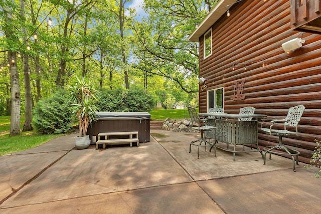 26182 Jericho Rd, Saint Joseph Twp, MN 56301 - view of patio featuring a hot tub and outdoor dining area