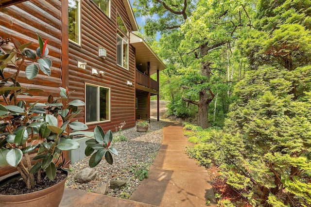 26182 Jericho Rd, Saint Joseph Twp, MN 56301 - view of property exterior featuring log veneer siding