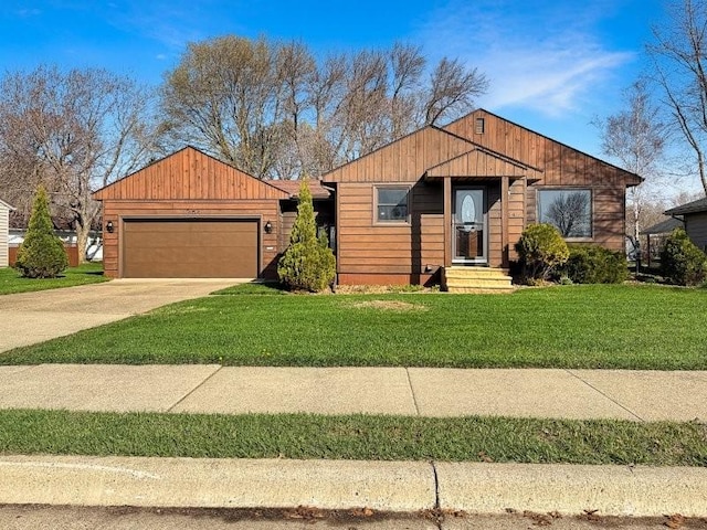 1254 State St, Fairmont, MN 56031 - single story home featuring a garage, entry steps, driveway, and a front lawn
