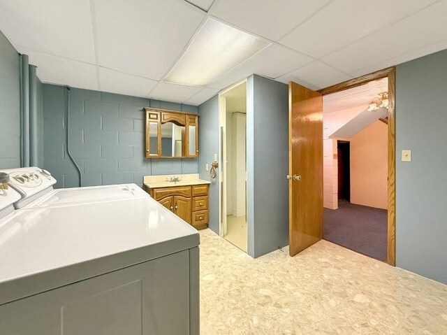 1254 State St, Fairmont, MN 56031 - laundry room featuring washer / dryer, a sink, and laundry area