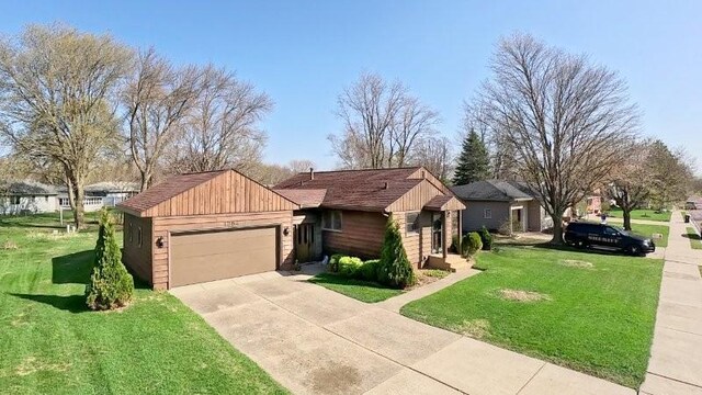 1254 State St, Fairmont, MN 56031 - ranch-style house with an attached garage, a front lawn, and driveway