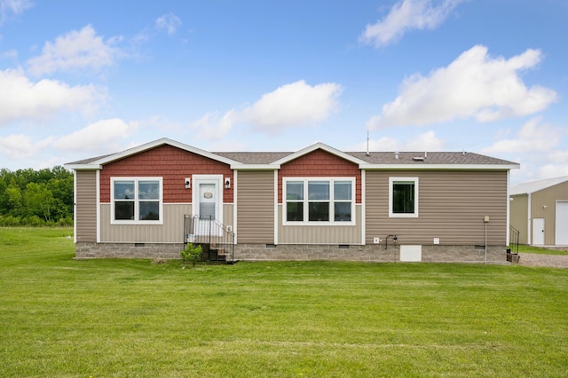 18394 145th Ave, Milaca, MN 56353 - rear view of property featuring crawl space and a lawn