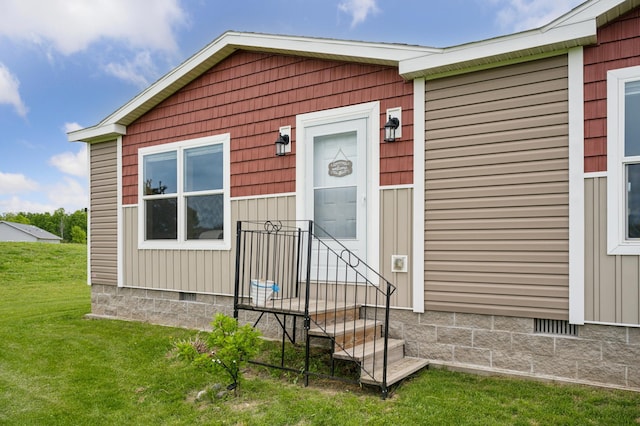 18394 145th Ave, Milaca, MN 56353 - property entrance with crawl space and a lawn