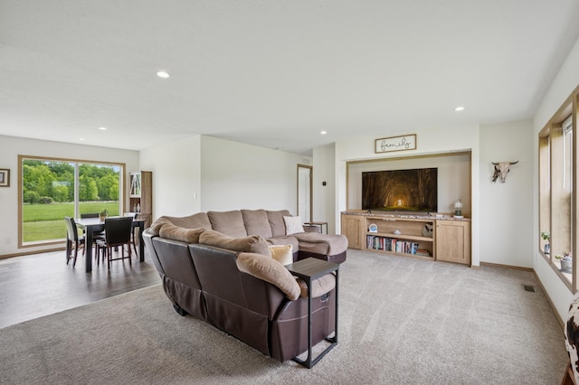 18394 145th Ave, Milaca, MN 56353 - living room with light colored carpet, recessed lighting, and baseboards
