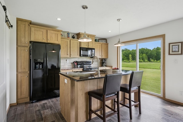 18394 145th Ave, Milaca, MN 56353 - kitchen featuring black appliances, a sink, dark wood-style floors, tasteful backsplash, and recessed lighting