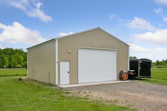 18394 145th Ave, Milaca, MN 56353 - detached garage featuring driveway