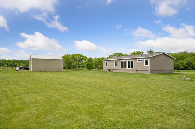 18394 145th Ave, Milaca, MN 56353 - view of grassy yard with an outdoor structure