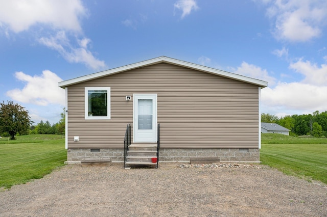 18394 145th Ave, Milaca, MN 56353 - view of front of property with entry steps, crawl space, and a front yard
